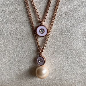 Kate Spade rose gold necklace with faux pearl.
